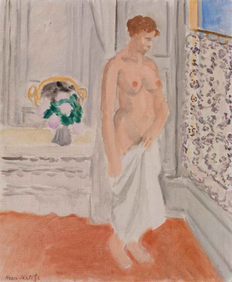 Standing Nude near Window by Henri Matisse (c.1918–20): a nude woman stands holding a white towel at her hip, beside half-open gray shutters and a lavender-patterned curtain that frames a glimpse of blue sky, all set above a terracotta-colored floor.