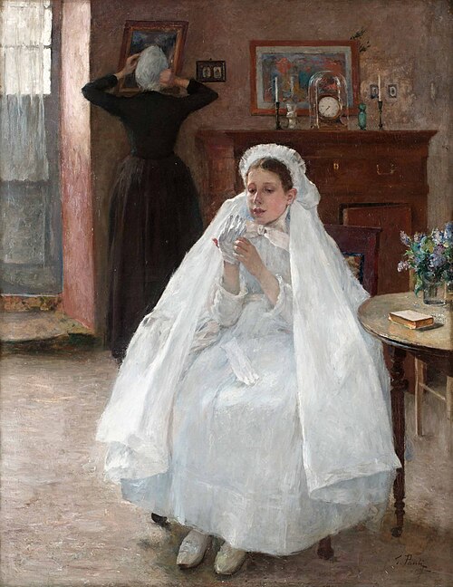 Painting "French Confirmand" by Georg Pauli. A young girl dressed in a flowing white confirmation gown and veil sits in a softly lit room, looking into a small mirror while adjusting her appearance. Behind her, an older woman adjusts a frame on the wall. The warm-toned interior includes a wooden chest of drawers, a clock, framed pictures, and a vase of flowers on a side table, creating an intimate and reflective atmosphere.
