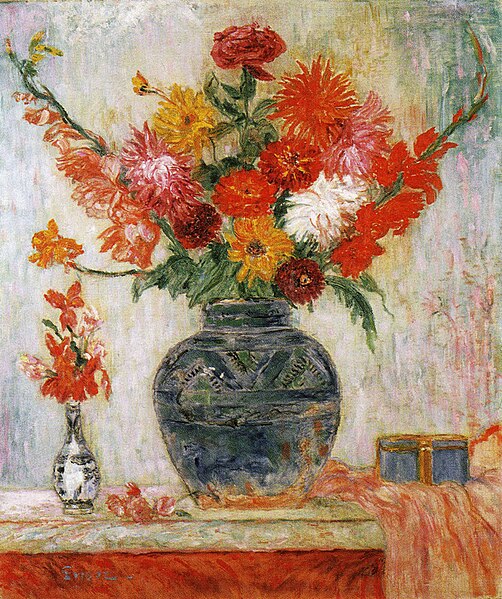 "Flowers in Sunlight" by James Ensor, showing a large ceramic vase filled with a vibrant bouquet of red, yellow, orange, and pink flowers, set on a tabletop with a smaller glass vase, a decorative box, and a draped pink cloth. The softly textured background and expressive brushwork highlight the play of natural sunlight and the lush, colorful arrangement.