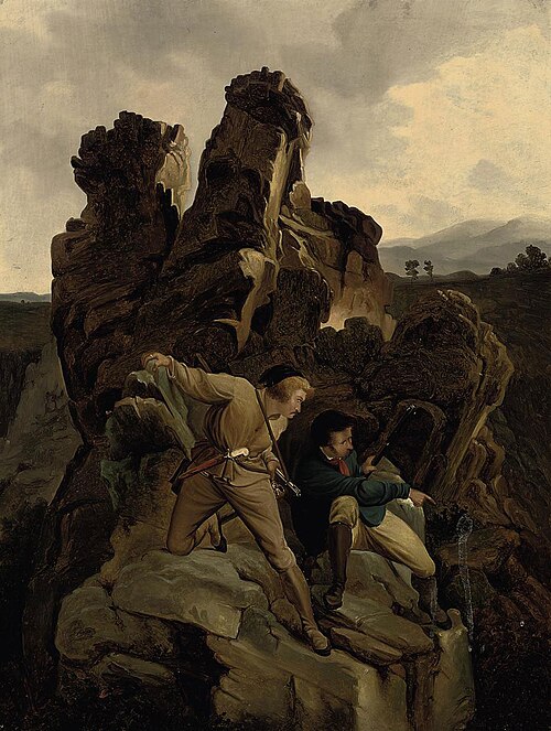 Preparing an Ambush by Karl Friedrich Lessing, depicting two armed men hiding among jagged rock formations, one standing with a sword and the other crouching with a firearm, set against a dramatic, rugged landscape under a cloudy sky, reflecting Romantic tension and historical conflict.