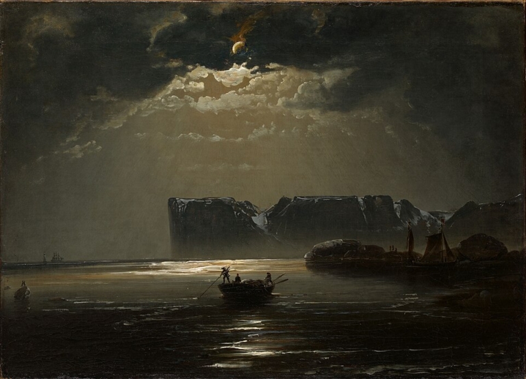 The North Cape by Moonlight (1848) by Peder Balke, depicting a dramatic Arctic scene with towering dark cliffs, a glowing full moon breaking through clouds, silvery moonlight reflecting on calm water, and small boats with tiny human figures, evoking the Romantic sublime and nature’s vastness.