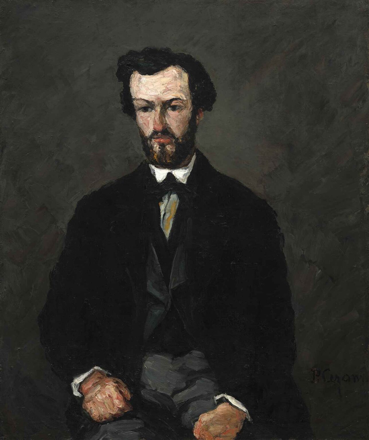 Oil painting by Paul Cézanne titled Antony Valabrègue (1866), showing a seated man in a dark suit against a shadowy background, painted with expressive, rough brushstrokes in a somber color palette.