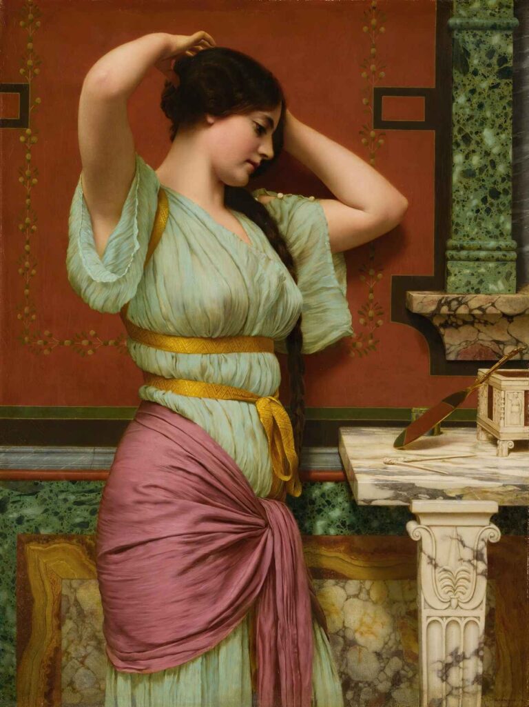 Neoclassical oil painting titled Julia by John William Godward (1914), depicting a young woman adjusting her hair in a Roman-style interior with green marble, classical drapery, and refined architectural elements.