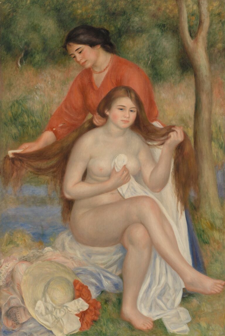A nude woman seated on a white cloth at a river’s edge holds a towel as her maid in a red blouse combs her long, wet hair against a background of green foliage and dappled sunlight.