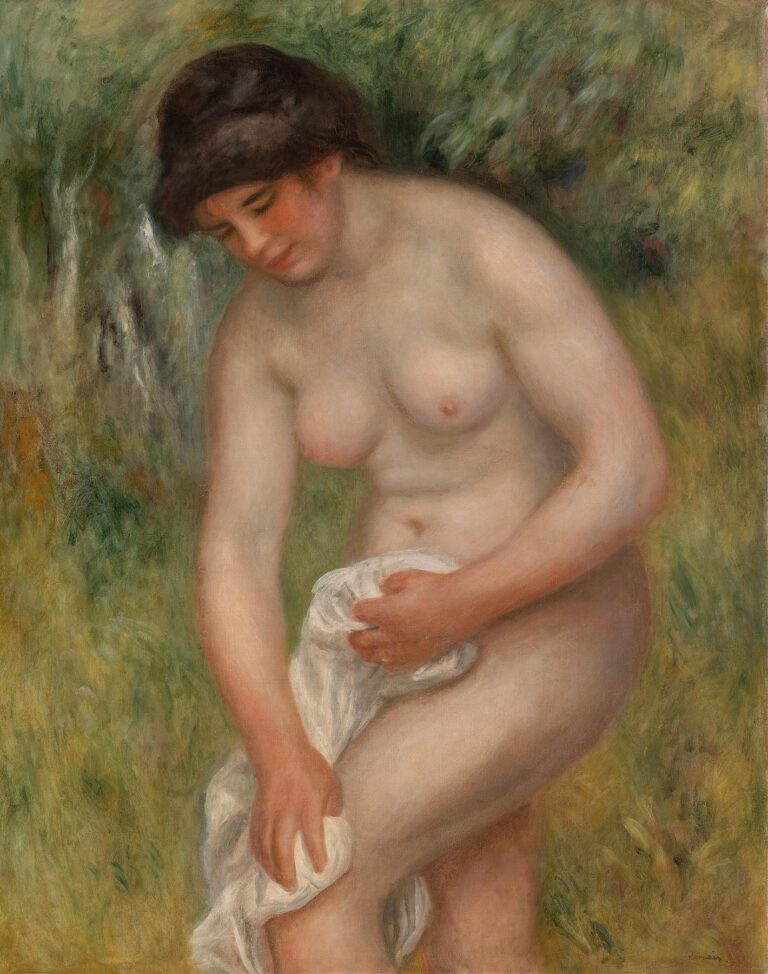 A nude woman bent forward in a leafy outdoor setting holds a white cloth against her leg, drying herself with gentle care, painted in soft, luminous brushstrokes by Renoir.
