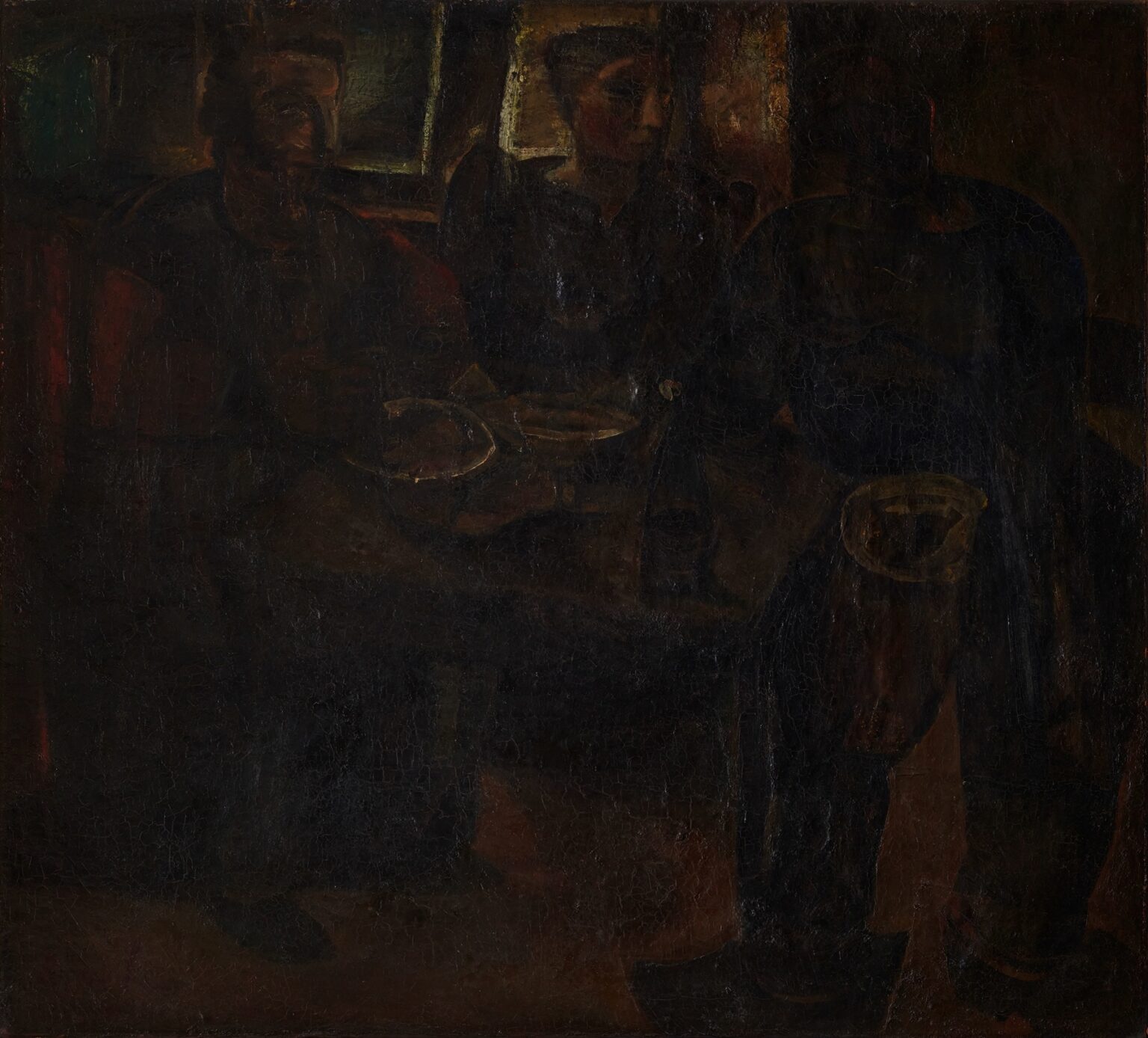 Constant Permeke’s 1921 painting “The Fishermen’s Meal” shows four rugged, wool-clad fishermen seated around a narrow wooden table in a dim room, breaking bread and eating salt-cured fish beneath a slitted window that casts a single beam of light across their weathered faces and rough hands.