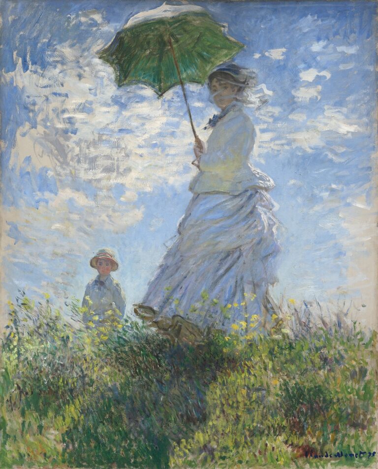 A sunlit outdoor scene showing a woman in a flowing white dress holding a green parasol above her head, while a young boy in a straw hat stands nearby among swaying grasses beneath a bright blue sky dotted with white clouds.