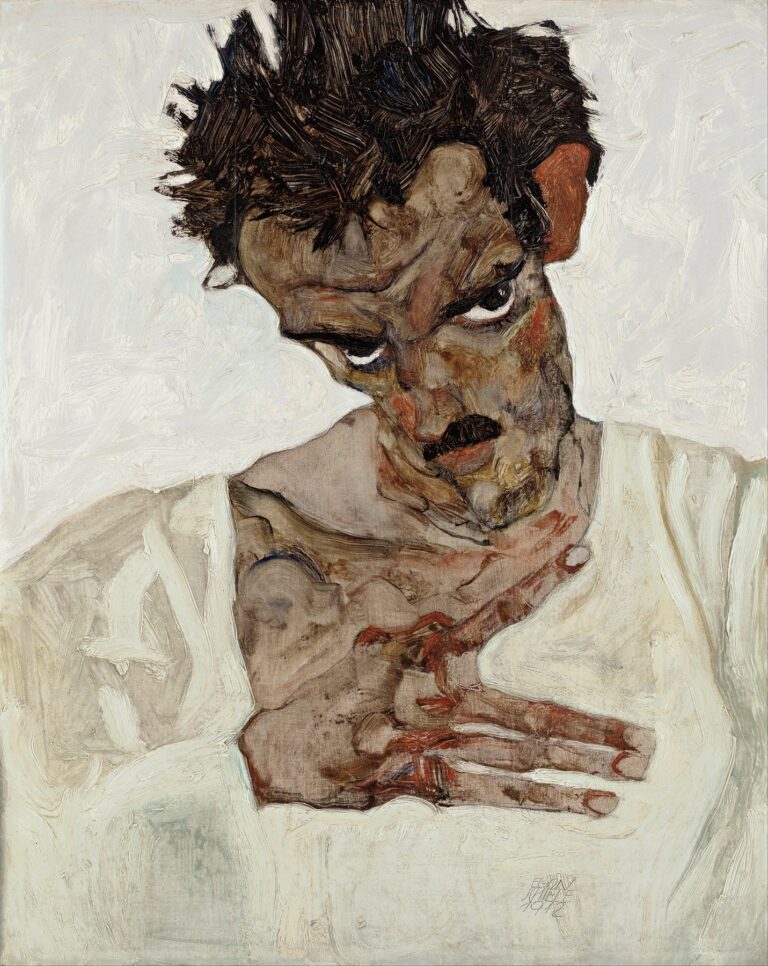 A self-portrait of Egon Schiele with his head bowed and dark, tousled hair; his gaunt, angular face and deep-set, intense eyes stare out beneath heavy brows, while an elongated hand with prominent knuckles presses against his chest, all rendered in expressive, rough brushstrokes of ochre, brown, red, and pale white.