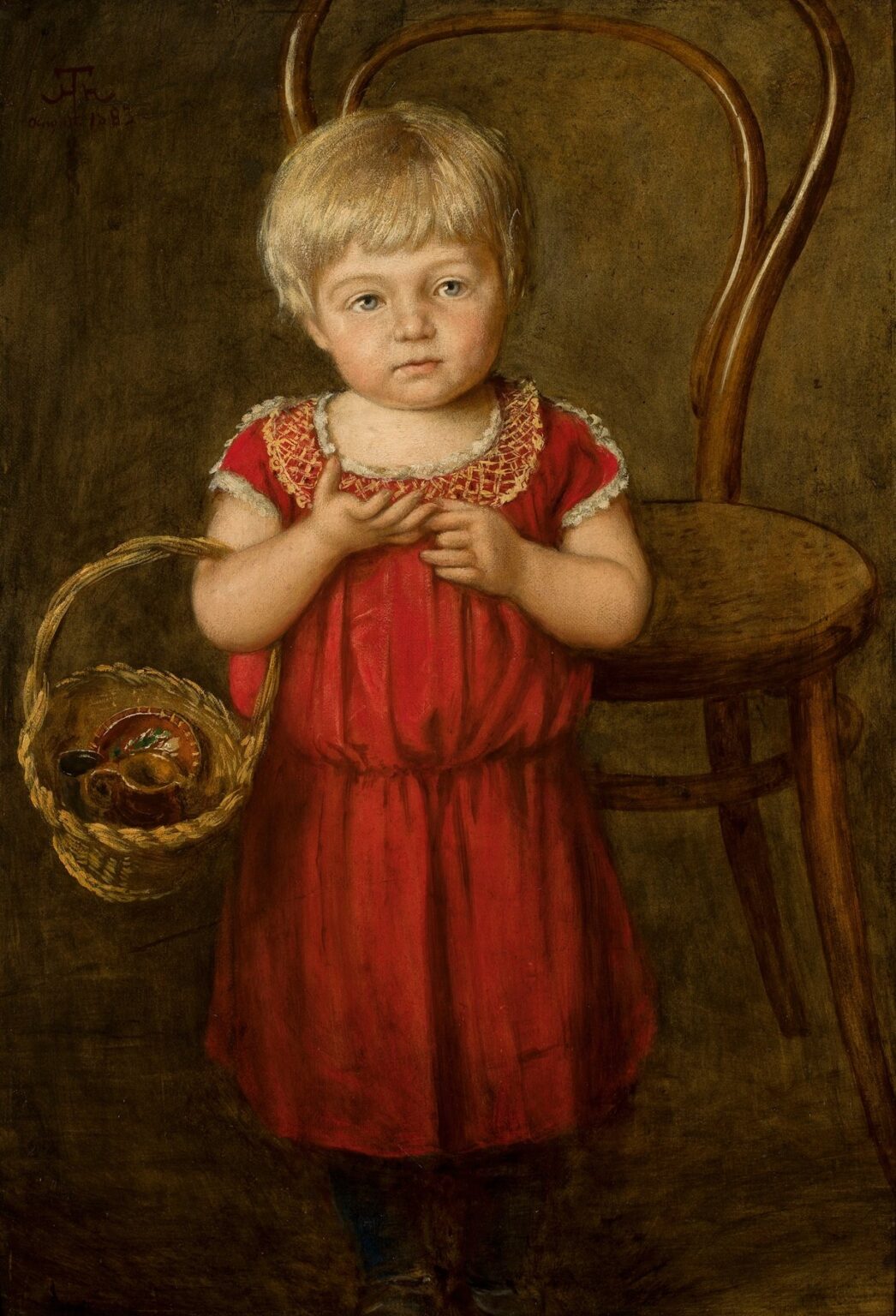 Oil painting of a young blonde child in a red lace-trimmed dress holding a small woven basket, standing barefoot beside a curved wooden chair against a warm brown background, gazing softly to the left.