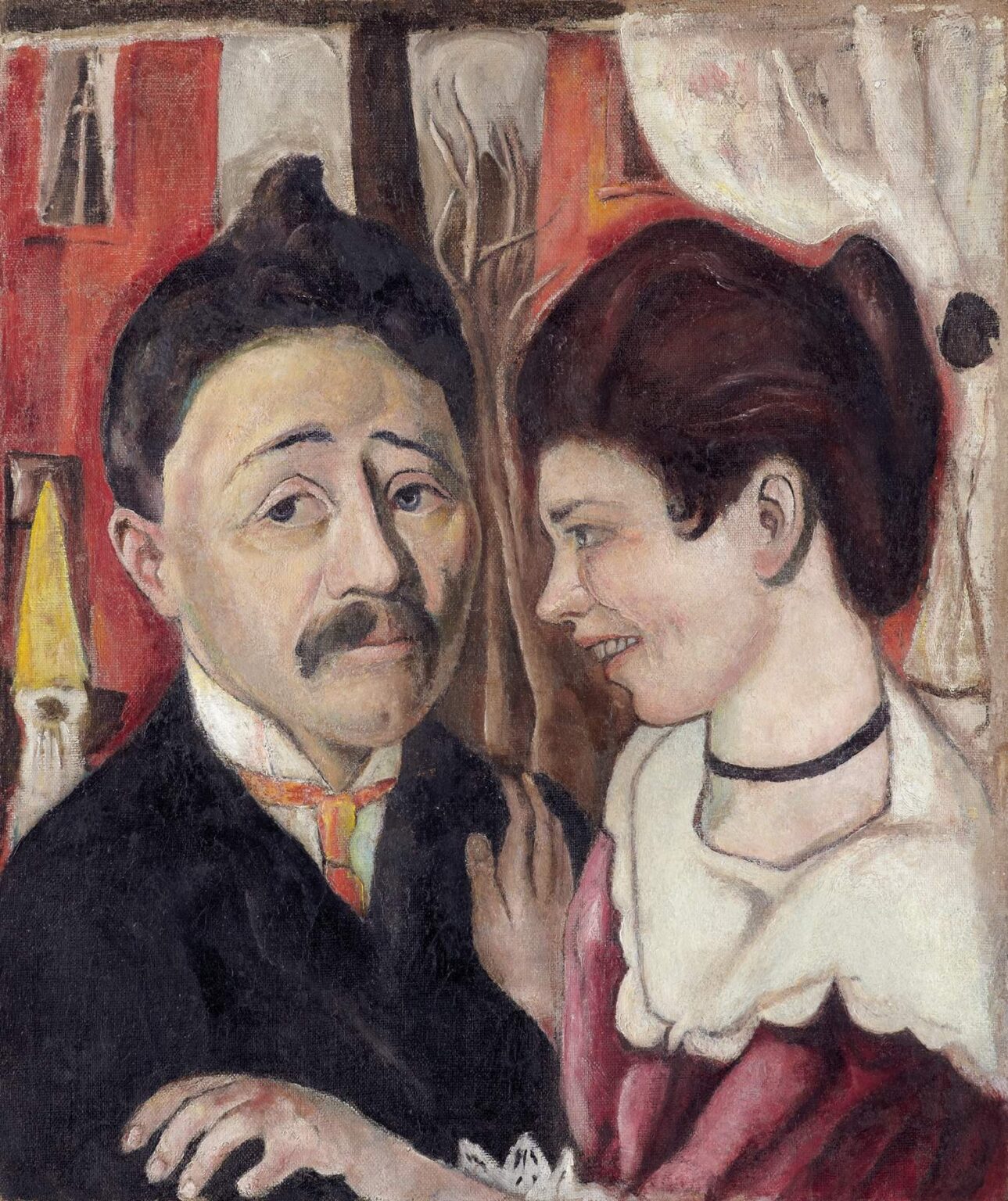 Max Beckmann’s Portrait of Carl Couple (1918), oil on canvas: a man in a dark suit and patterned tie sits beside a smiling woman in a rose dress with a white scalloped collar, set against red and white geometric panels.
