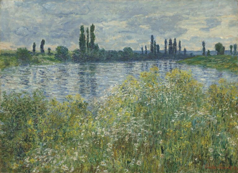 Monet’s painting of a wildflower-strewn riverbank with yellow and white blooms in the foreground, the Seine’s rippling blue-gray water behind, and tall poplar trees silhouetted against a cloudy sky.