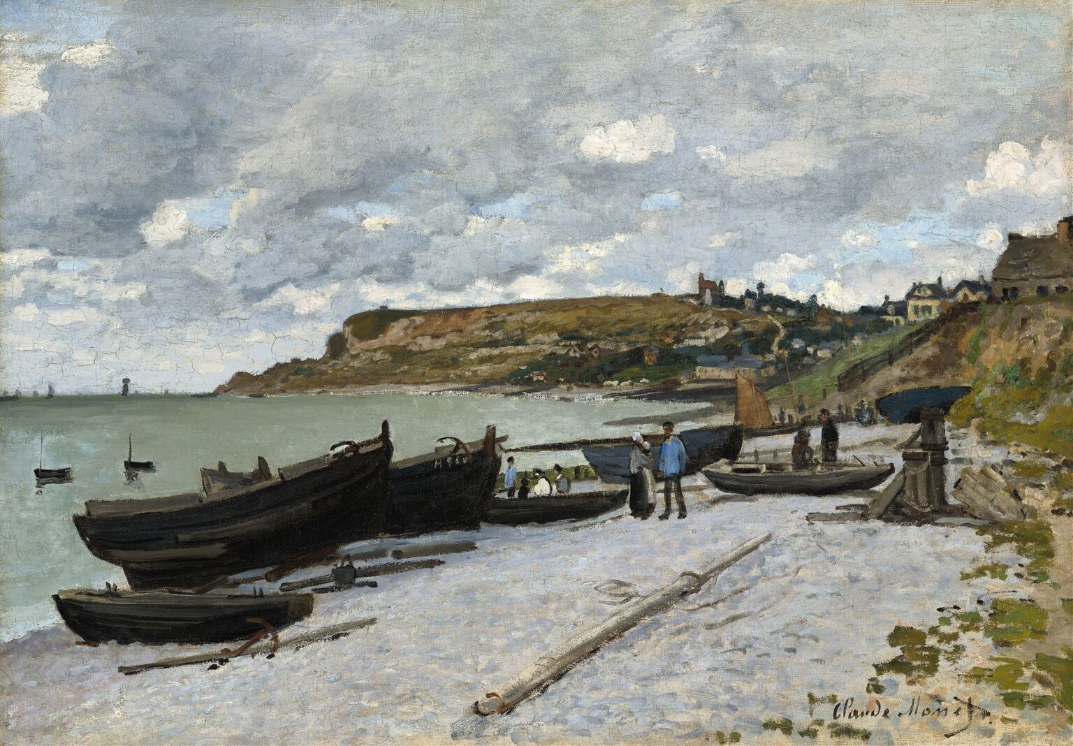 A broad coastal panorama showing elegantly dressed figures strolling on a sunlit pebble beach beside sailboats on a shimmering estuary, with terracotta-roofed villas atop a bluff and a cloudy sky overhead.