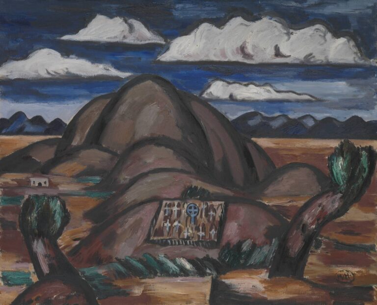 Marsden Hartley’s Cemetery, New Mexico (1924), oil on canvas displaying an adobe burial mound draped in an embroidered cloth, flanked by two gnarled desert trees, with rolling hills and a deep blue sky of horizontal clouds.