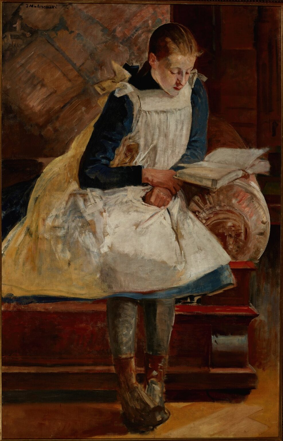 Oil painting by Jacek Malczewski showing young Julia seated on a carved wooden bench, wearing a blue dress and white pinafore, reading a book in a warmly lit interior.
