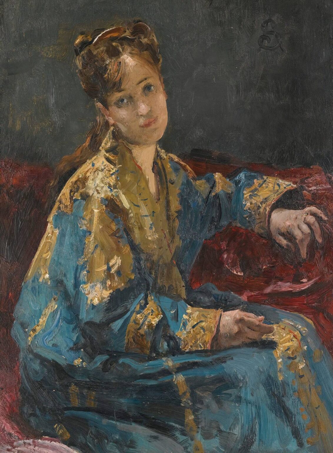 Portrait of a seated woman in a sapphire‑blue silk gown with gold embroidery, reclining against a deep red couch, her thoughtful gaze directed at the viewer against a dark, painterly background.