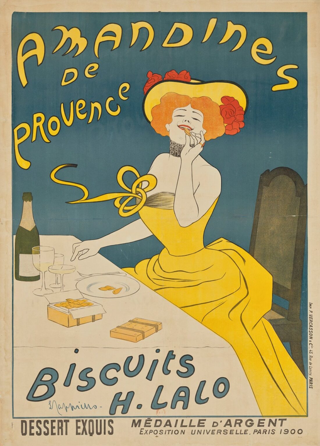 Art Nouveau poster depicting a red-haired woman in a flowing yellow gown reclining at a table as she savors an almond biscuit, set against a teal background with stylized yellow lettering that reads “Amandines de Provence” and “Biscuits H. Lalo.”