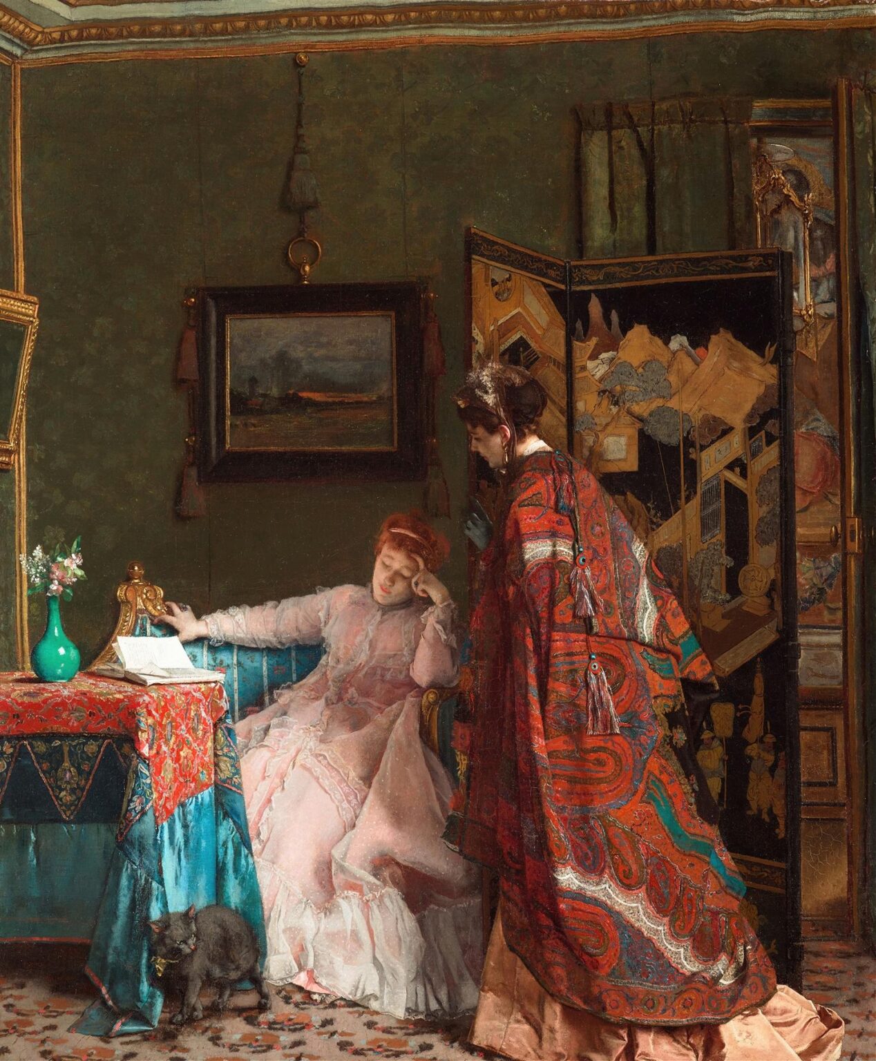 Two well‑dressed women in a richly decorated 19th‑century salon—a seated figure in rose‑pink with a letter in hand and a standing friend draped in a red paisley shawl—while a black cat prowls at their feet.