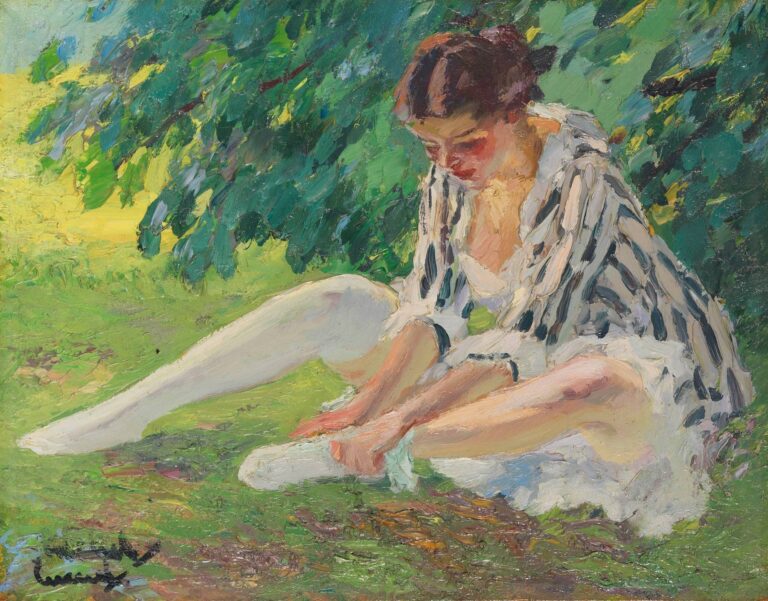 Impressionist oil painting of a woman in a striped jacket and white underdress seated on green grass under a leafy canopy, leaning forward to adjust her shoe.