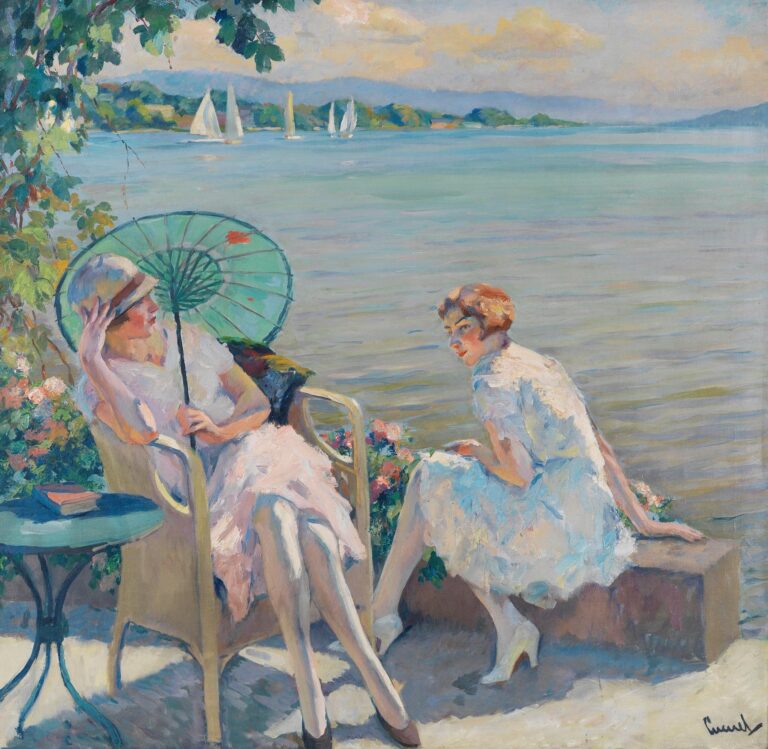 Two women in white dresses under leafy shade beside a blue-green lake; one holds a green parasol while seated in a wicker chair, the other sits on a low stone wall with crossed legs.