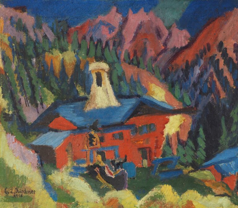 Expressionist painting by Ernst Ludwig Kirchner showing a red alpine house with angled roofs and a bell tower set against green trees and jagged pink mountains under a deep blue sky.