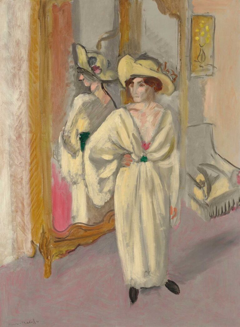 Interior scene with a woman in a flowing white dress and wide-brimmed hat standing before a tall gold-framed mirror; her reflection appears at left, slightly angled; room rendered in soft grays and mauve floor with a sofa fragment at right; small green clasp at the waist, pink accent at chest, and loose, airy brushwork throughout.