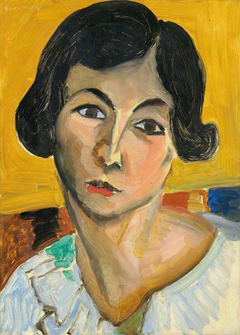 Close-up portrait of a woman called Lorette with dark wavy hair, head slightly tilted and eyes glancing sideways, painted with broad visible strokes. Her face is modeled in warm ochres and cool grays; lips are a small red accent. A mustard-gold background surrounds the head, with small bands of red and blue at right and hints of a light blouse at the bottom. Painted by Henri Matisse in 1917.
