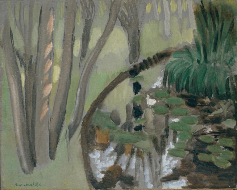 A gray-green landscape showing a narrow stream curving through trees, with vertical trunks on the left, a dark arcing bank across the center, lily-like pads in the water, and a fan of deep green rushes at right. Thin, calligraphic brushstrokes and soft reflections create a quiet, atmospheric scene. Painted by Henri Matisse in 1918.