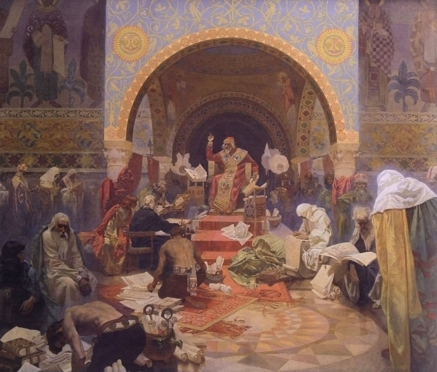Monumental interior by Alphonse Mucha showing Tsar Simeon I seated on a dais beneath nested Byzantine arches, raising his hand while monks, scholars, and craftsmen crowd the foreground copying texts, reading scrolls, and working at low desks; richly patterned walls, carpets, and a tiled floor create a golden, scholarly atmosphere.