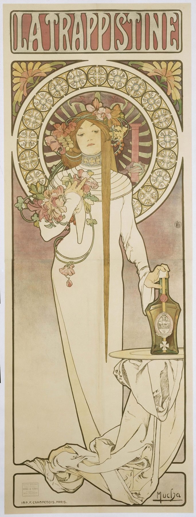 A tall Art Nouveau poster featuring a serene woman in a long white gown standing beside a small table holding a decorative bottle, her hair and floral crown framed by a detailed circular halo of golden medallions, with the title “LA TRAPPISTINE” in stylized letters across the top.
