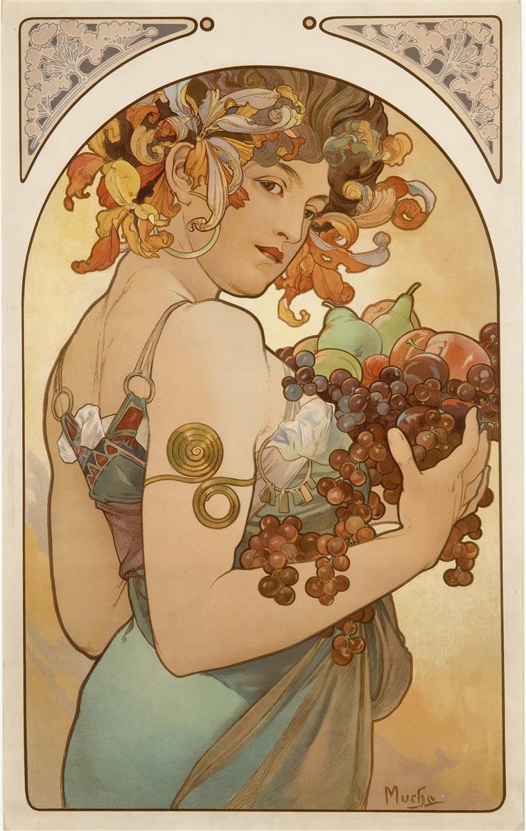 Art Nouveau panel by Alphonse Mucha showing a young woman turned over her shoulder, crowned with lilies and flowing curls, cradling clusters of grapes and assorted fruit against a warm golden background. She wears spiral armlets and a teal draped dress; the image is framed by an arched border with patterned spandrels. 1897.