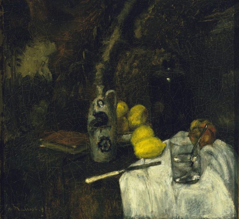 A dark still life with a white cloth draped over a table, a clear glass half filled with water, a knife with pale handle, several bright lemons, an apple, and a stoneware Dutch gin bottle with blue medallions; a worn book recedes into shadow as soft highlights model the forms.