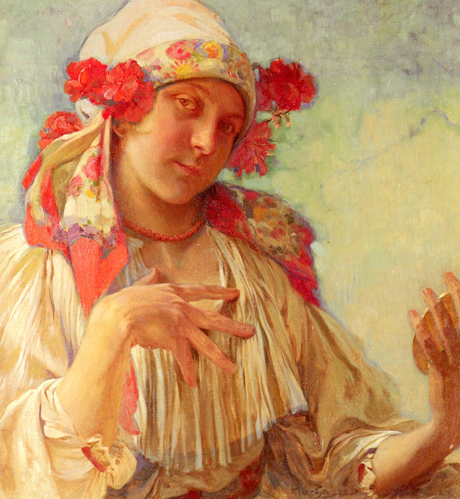 Oil portrait by Alphonse Mucha of a young woman in Moravian folk costume, wearing a floral headscarf with red blossoms at her ears, a coral bead necklace, and a pleated white blouse; one hand spreads gracefully while the other holds a small round object against a soft blue-green background.