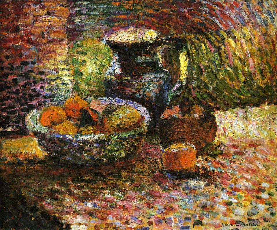Thickly painted still life of a patterned table and wall formed by small, colorful brushstrokes; a ceramic pitcher, a bowl filled with oranges and other fruit, and round vessels sit under arched, multicolored strokes; mosaic-like dots create shimmering light and depth.