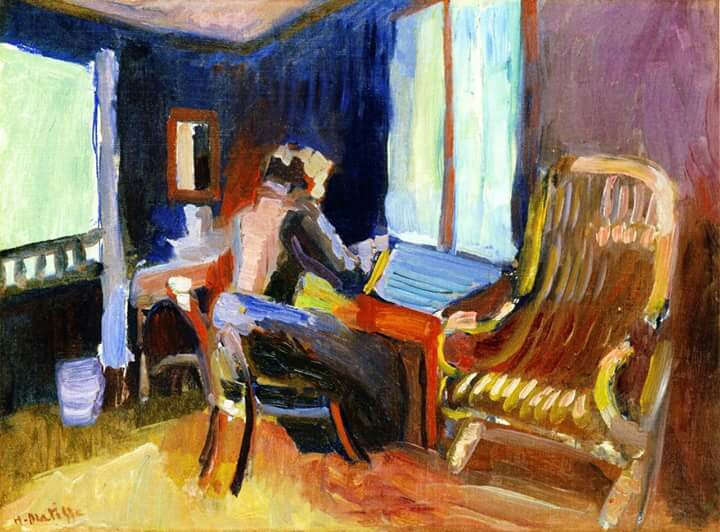 Small interior with a woman writing at an orange desk near a bright window; deep blue-violet walls, amber floor, and a large golden chair in the foreground; broad, expressive brushstrokes and warm–cool color contrasts create a calm, luminous atmosphere.