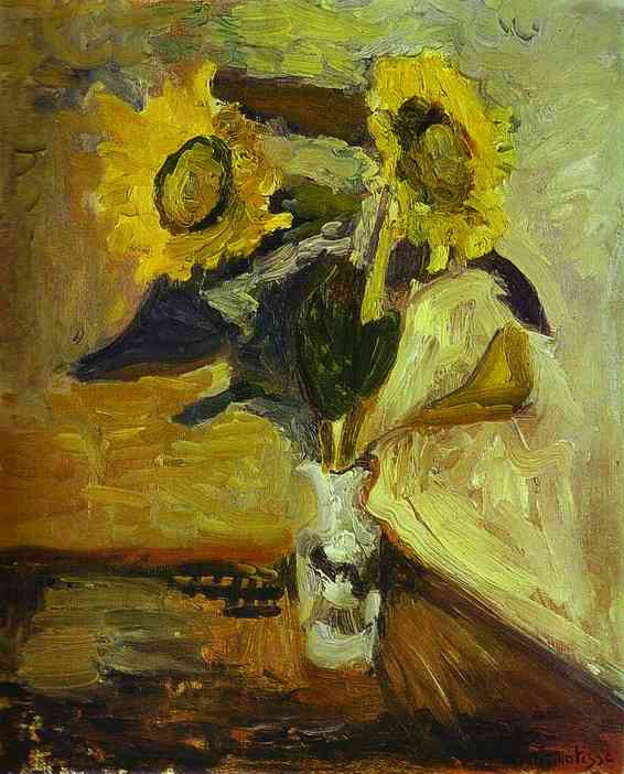Small oil painting of two sunflowers in a glass vase on a table beside a draped white cloth; heavy yellow and green brushstrokes shape the flowers and background, with warm ochres and cool shadows forming the scene.