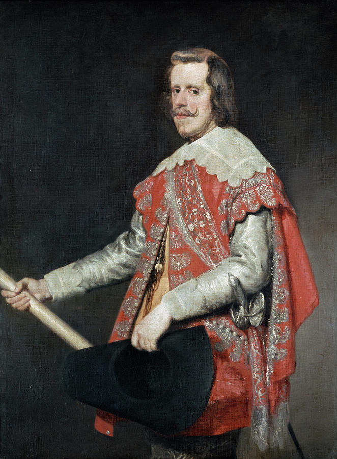 Three-quarter portrait of Philip IV wearing a silver suit and richly embroidered red cape, holding a marshal’s baton and a black hat, shown against a dark background with calm, direct gaze and subtly glowing light.