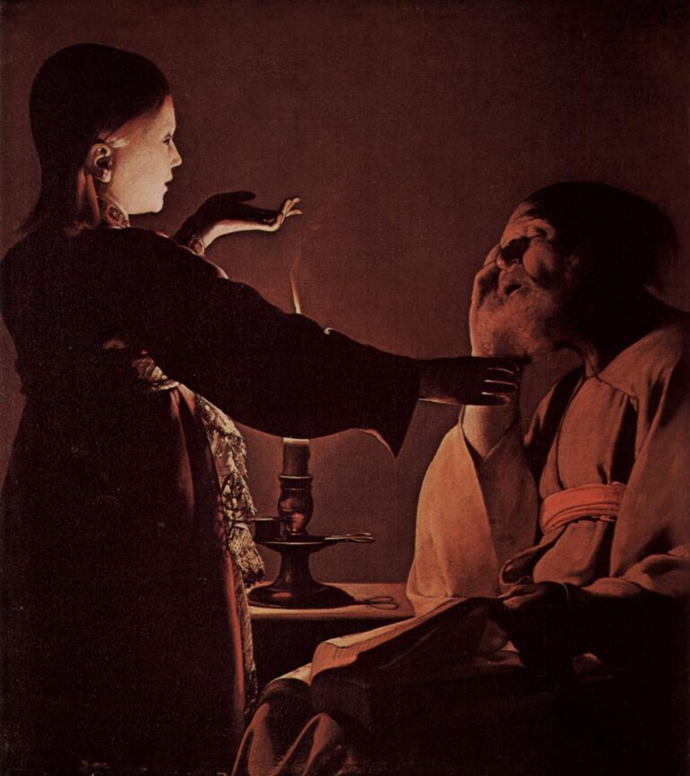 Candlelit scene of a young angel standing in profile with hands raised toward the seated St. Joseph; a small flame glows between them on a brass holder, an open book lies on Joseph’s lap, and warm shadows model both figures against a simple wall.