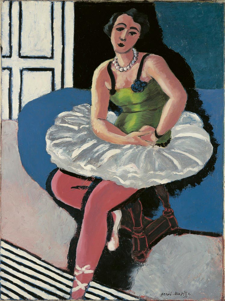 Ballet dancer in green bodice with pearl necklace seated on a wooden stool; large white tutu forming a ring, pink tights crossing diagonally, black-and-white striped rug at lower left; flat blue and black wall with white door panels; Henri Matisse, 1927.