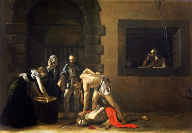 Large Baroque painting of a prison courtyard where an executioner bends over the fallen Saint John as witnesses look on; Salome holds a platter, two prisoners peer from a barred window, and a vivid red cloak and pool of blood glow against austere stone walls.