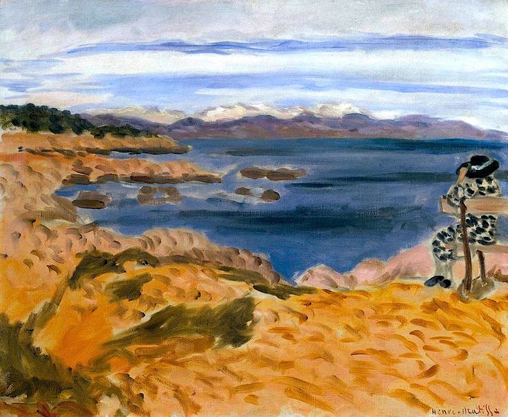 Sunny Mediterranean landscape with ochre headland in the foreground, deep blue sea dotted with small rocky islets, pale mountains and layered clouds on the horizon; at the right edge a small figure in a spotted dress and hat sits on a bench looking out over the water.