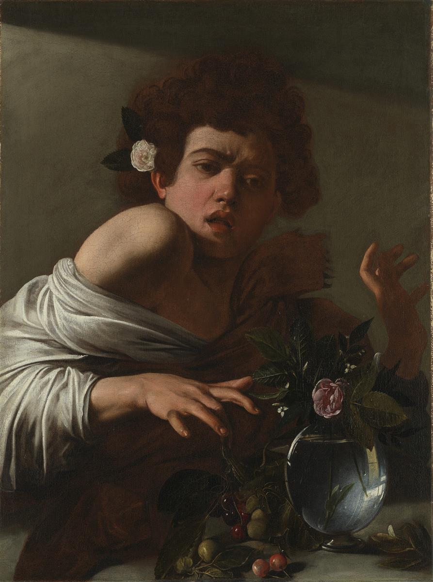 Half-length youth with flower in hair recoils as a lizard bites his finger near a vase of water and scattered fruit; dramatic light illuminates face, shoulder, sleeve, and glass while background falls into deep shadow; oil on canvas by Caravaggio, 1596.