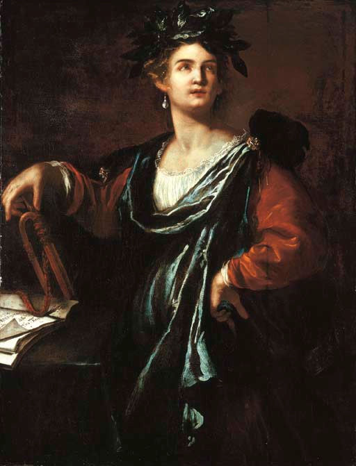 Half-length Clio crowned with laurel, draped in blue-green mantle over orange gown, left hand resting on a table with papers and a small lyre, right hand on hip, face turned toward light against a dark background.