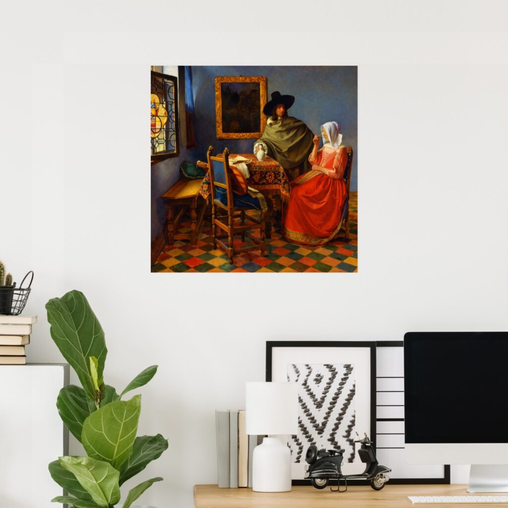 Poster of “The Glass of Wine” by Johannes Vermeer displayed in a modern home office, featuring a framed Dutch Golden Age interior scene on a white wall above a desk.