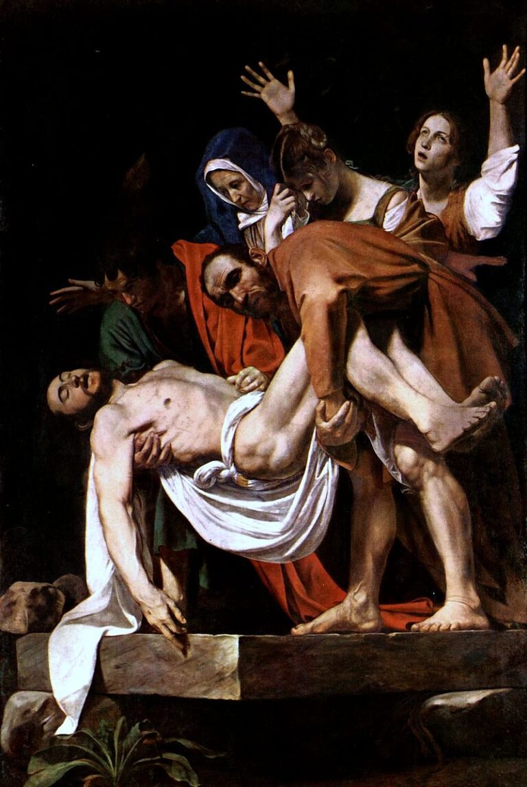 A group of mourners lowers the dead Christ onto a forward-jutting stone slab; Nicodemus strains at the feet, John supports the shoulders, and three women grieve behind under deep shadow, with strong light modeling bodies, cloth, and stone.