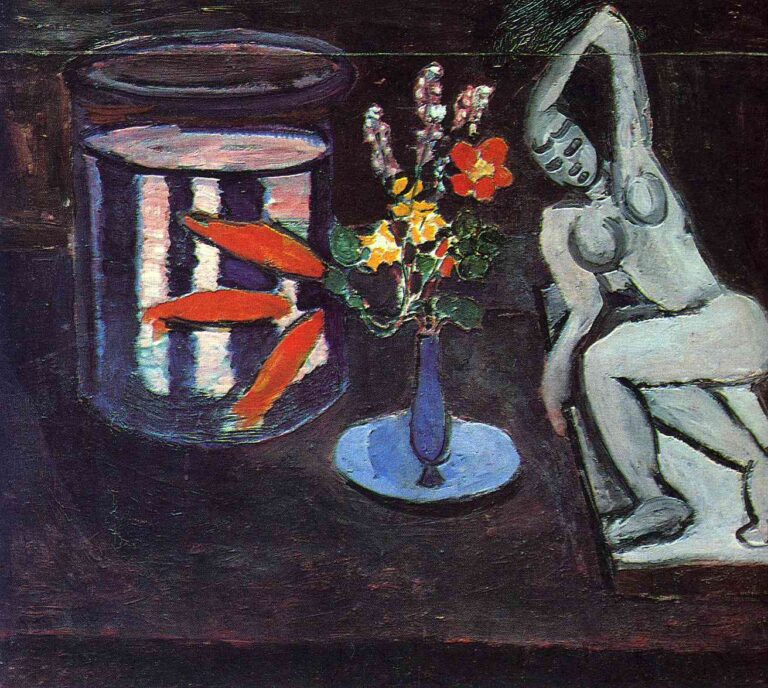 A dark studio still life by Henri Matisse showing a cylindrical glass bowl with bright orange fish at left, a small blue vase of flowers in the center, and a pale reclining sculpture at right, all rendered in simplified forms with strong blue-black grounds and vivid color accents.