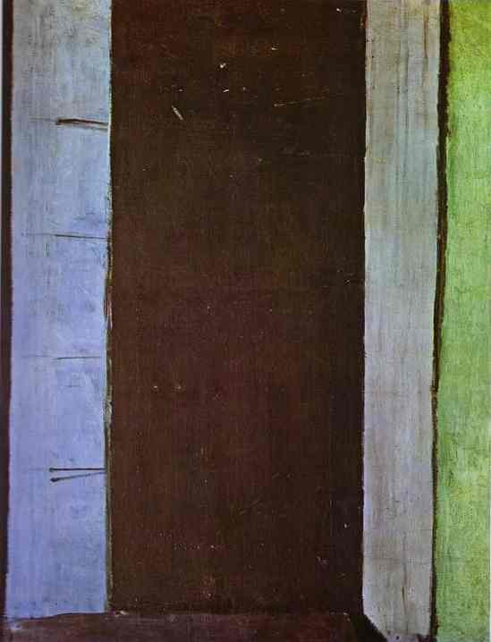 Tall canvas with a large black-brown central panel bordered by a blue band at left, a thin stone-gray strip, and a narrow green strip at right; a small diagonal wedge of floor at lower right suggests an interior French window, painted by Henri Matisse in 1914.