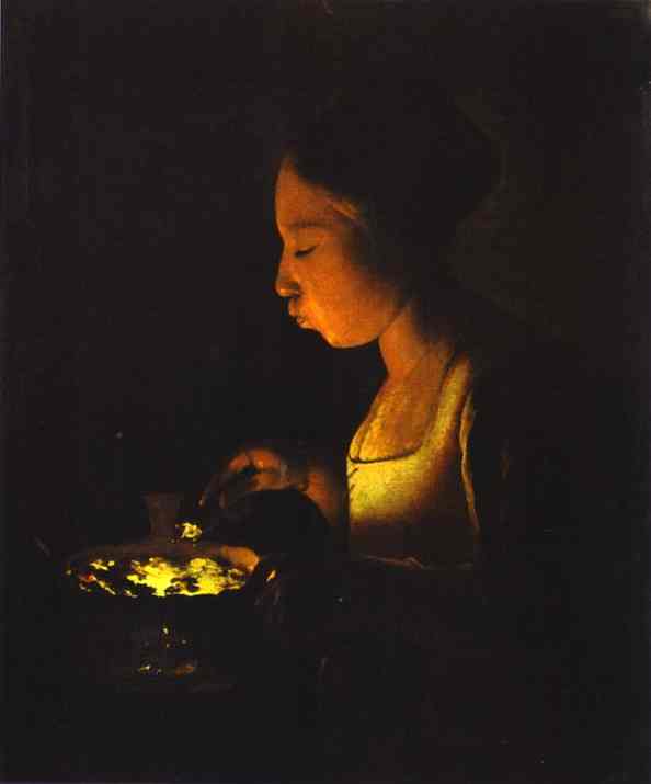 Ember-lit profile of a young woman leaning over a small brazier, cheeks aglow as she prepares to blow on the coals; her hand hovers with a tool while the surrounding room dissolves into deep shadow.