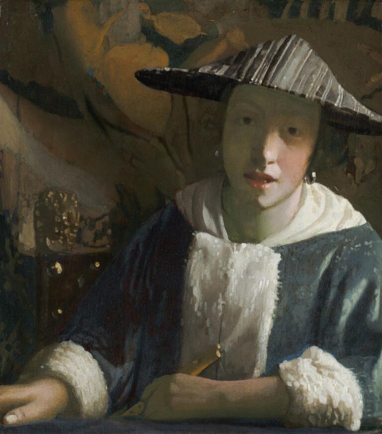 Close view of a young person in a blue, fur-trimmed jacket holding a flute, with a striped, wide-brimmed hat casting a soft shadow across the face; warm, muted background shapes and gentle daylight emphasize a quiet moment before music begins.