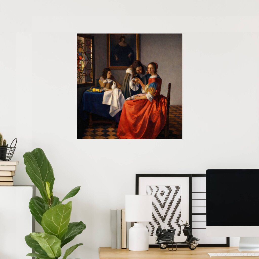 Poster of Johannes Vermeer’s “A Lady and Two Gentlemen” hanging on a modern home office wall above a desk with computer, books, and green houseplant.