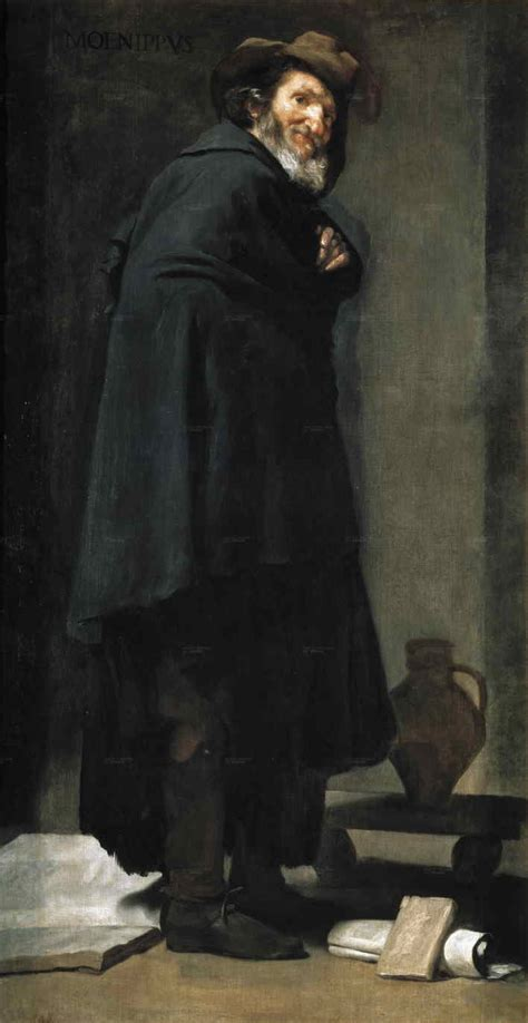 Full-length figure of a bearded man in a dark cloak and hat turning back with a wry smile; he stands in a sparse room with a jug, book, and scroll on the floor, illuminated by soft side light against a breathable gray-brown background.